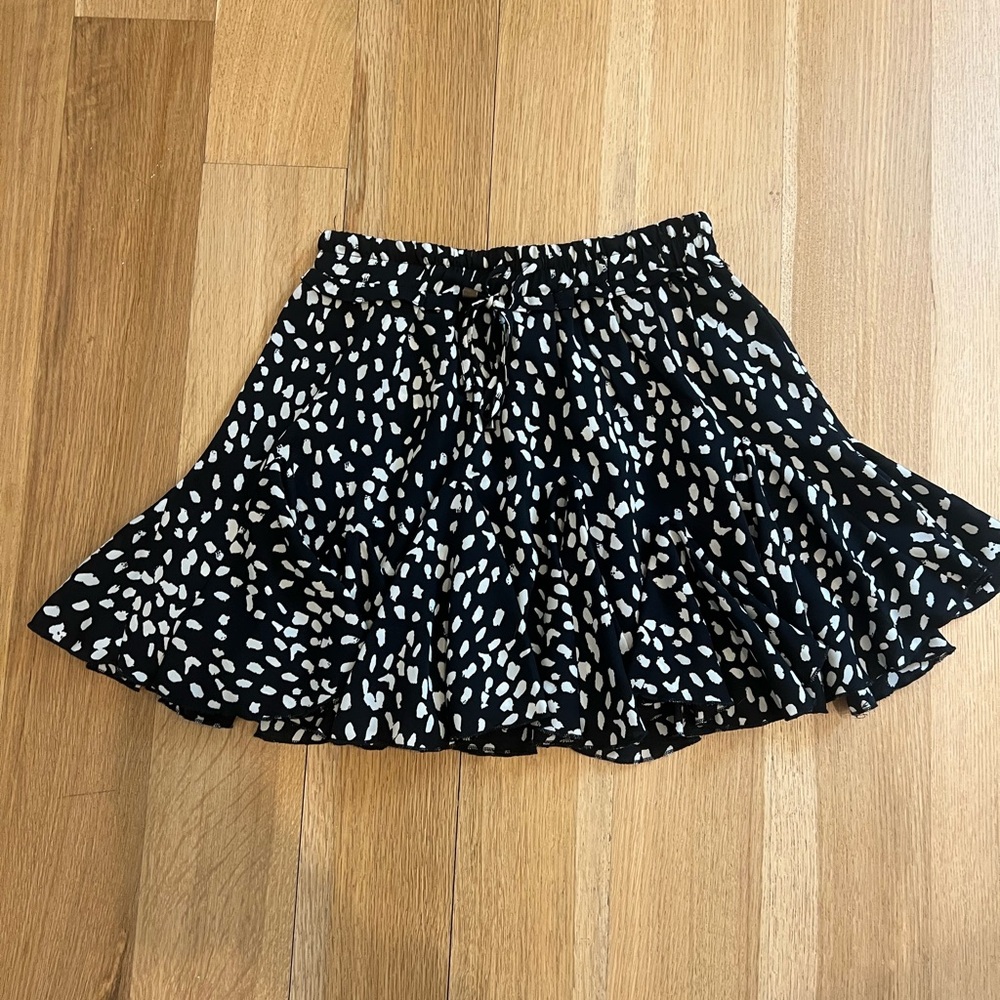 Black with white polka dots mini skirt